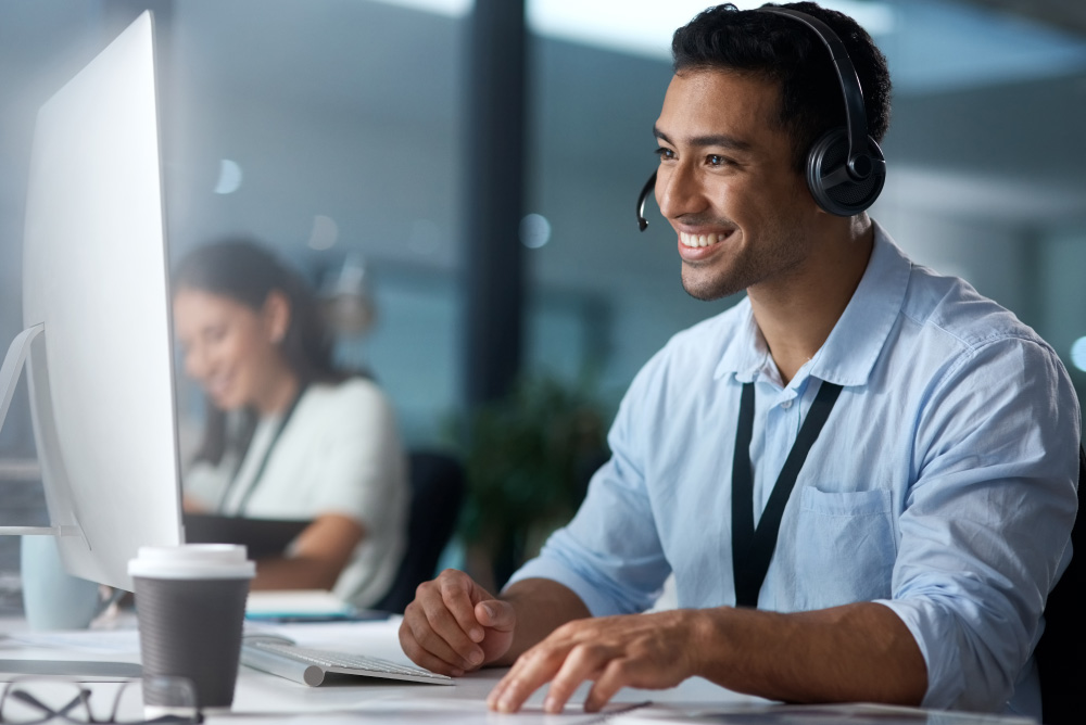 tech support worker at computer