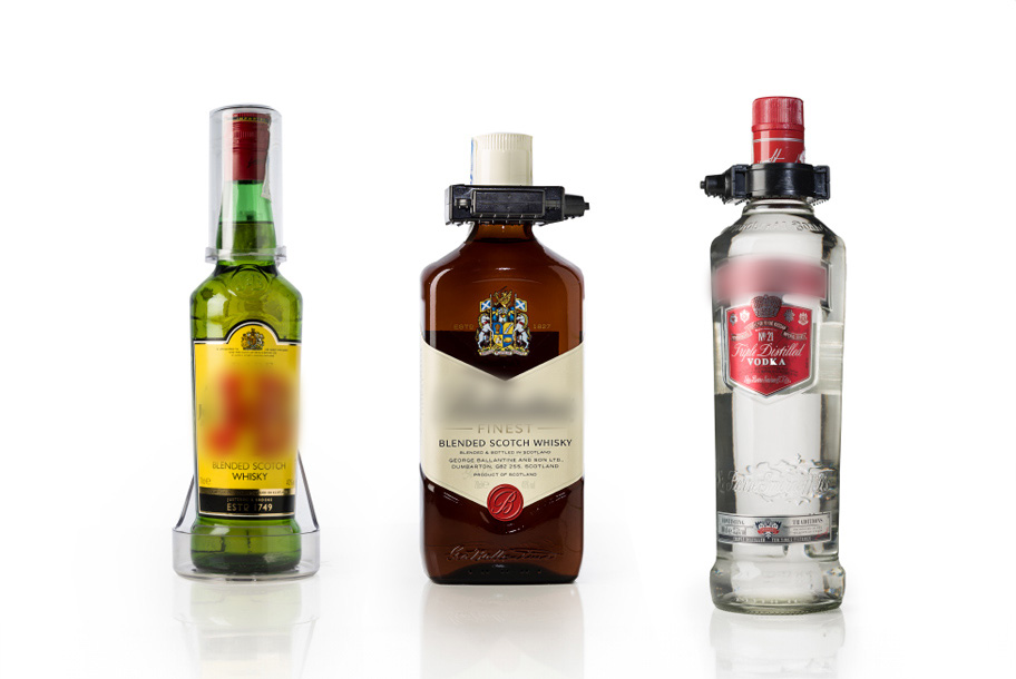 alcohol bottles with security devices